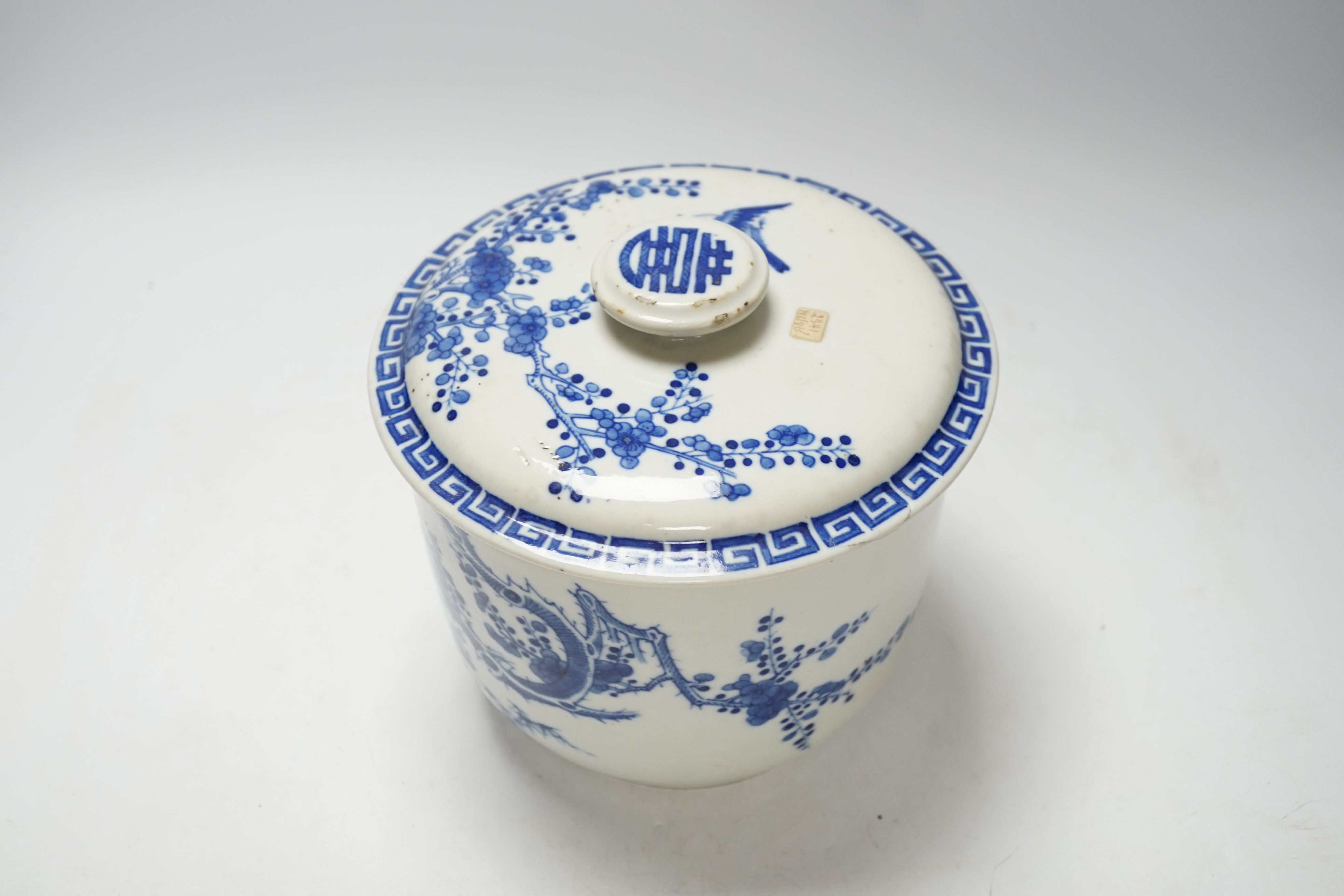 A Chinese porcelain blue and white inscribed jar and cover, 19th century, possibly made for the Vietnamese market, 18cm high